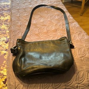Roots leather bag